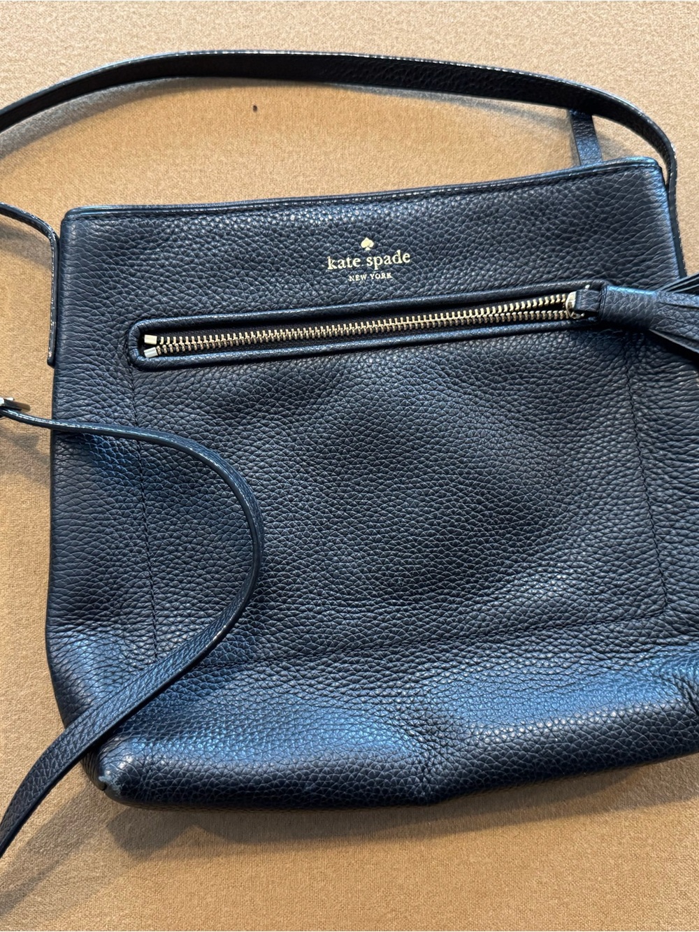 kate spade black pebbled leather crossbody with gold zipper with receipts
